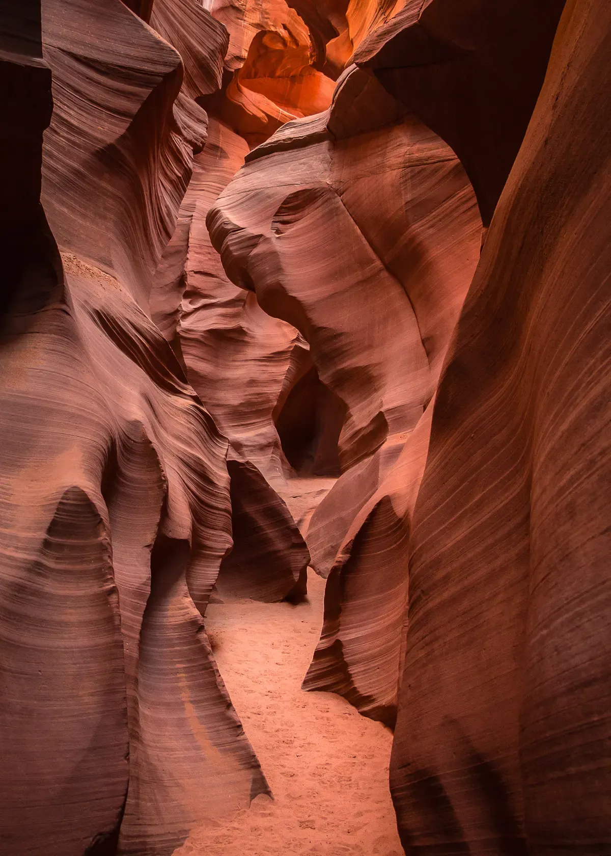Curved sandstone corridor inside Antelope Canyon, a stop on an Antelope Canyon tour from Las Vegas, Page, Arizona.