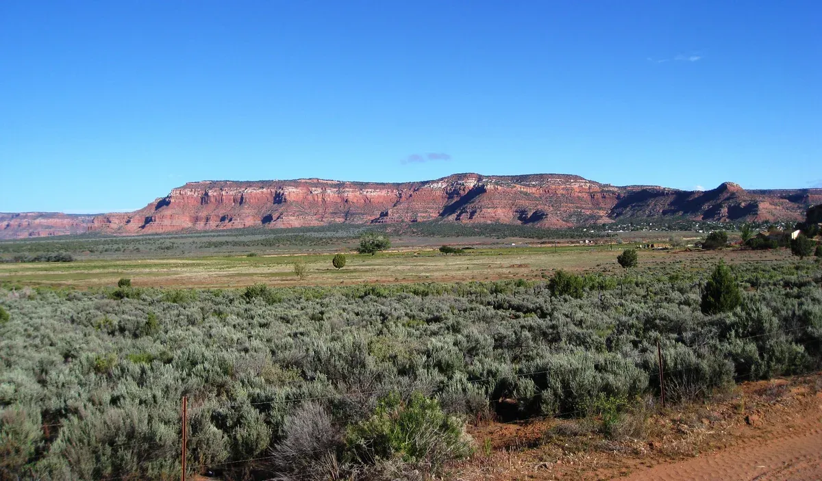 Vermilion Cliffs in northern Arizona, the red-rock country crossed on an Antelope Canyon tour from Las Vegas to Page, Arizona.